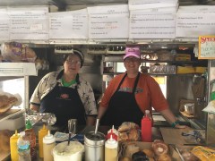 Eleni Grohimos, with daughter Stella, has operated the food cart at Broad and Sansom for about 35 years.