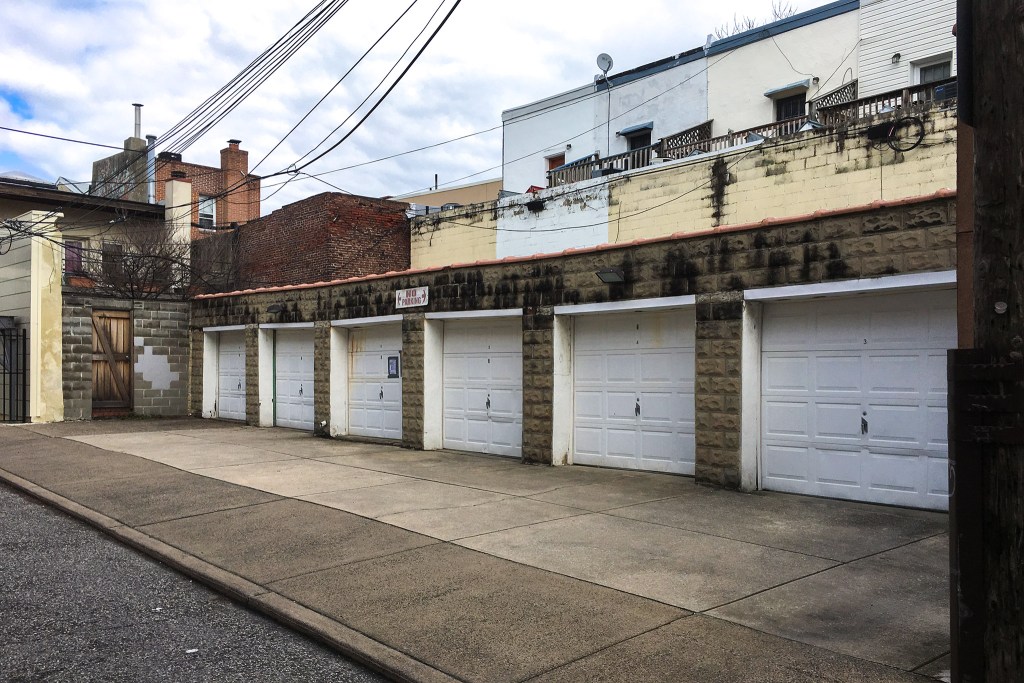 The garages at 729-33 Pemberton Street are up for development — and they're adjacent to a possible historic burial ground