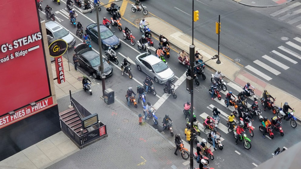 A group of dirt bike riders on North Broad Street in May 2020