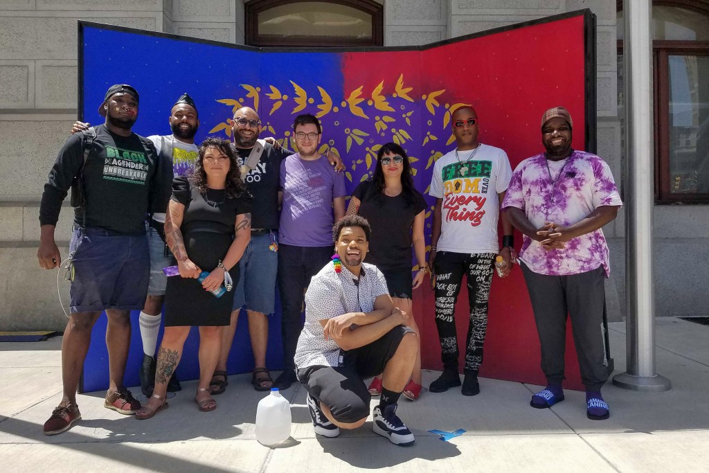 Some of PHL Pride Collective's organizers (L - R): Maso Kibble, Diamond Anthony, Jessica Kallup, Manny Frank-Lampon, Rich Frank-Lampon, AndrΓ© Henson aka Alzei Barbei Mizrahi, Elicia Gonzales, Jamaal Henderson, Abdul-Aliy Muhammad