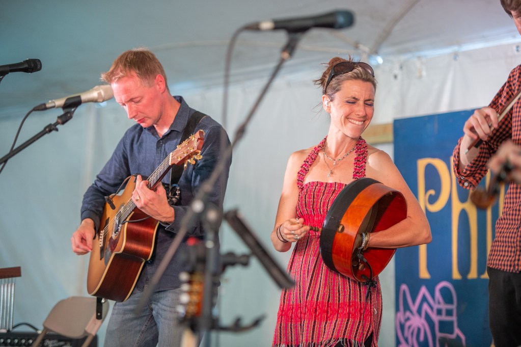 Co-founders of the band RUNA Fionán de Barra, left, and Shannon Lambert-Ryan perform at the Philadelphia Folk Festival on Saturday afternoon on the Lobby Stage
