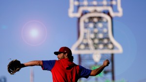 Phillies catcher Garrett Stubbs warms up during batting practice before Game 3 of NLCS at Citizens Bank Park