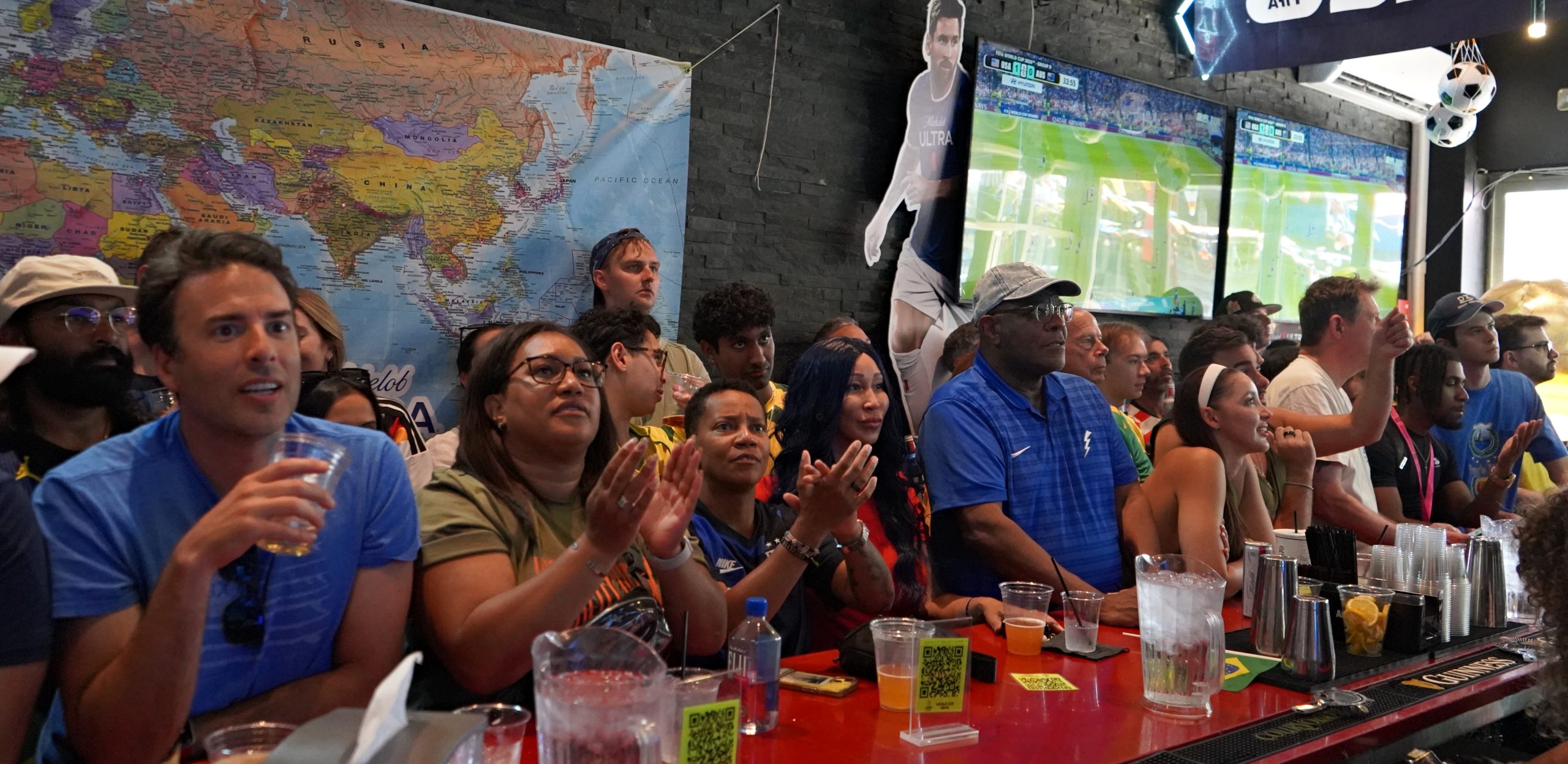 Both local and international soccer fans seem happy to tip their servers — even when it's mandatory.