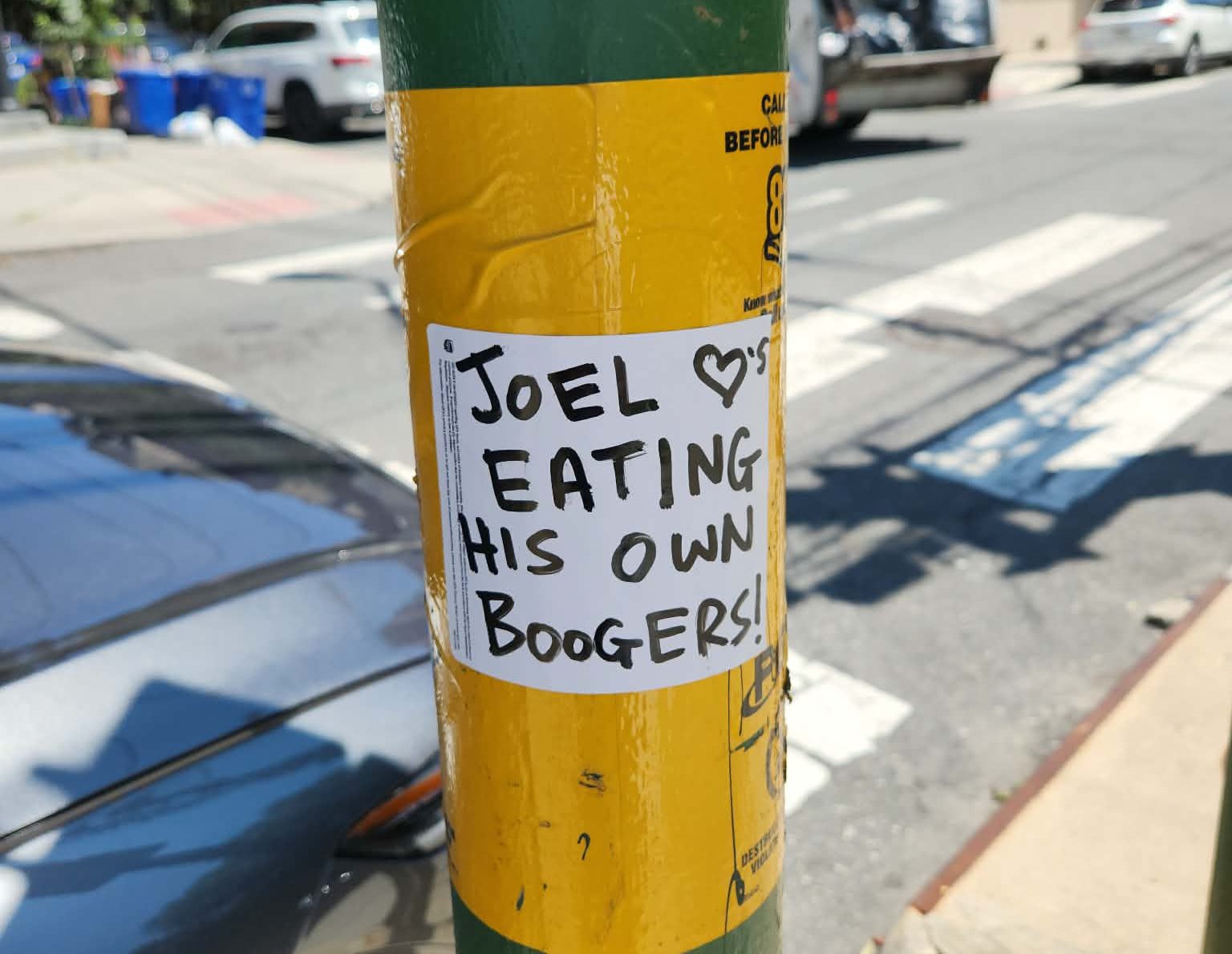 Street artists in Bella Vista are trolling a guy named Joel. Here’s why